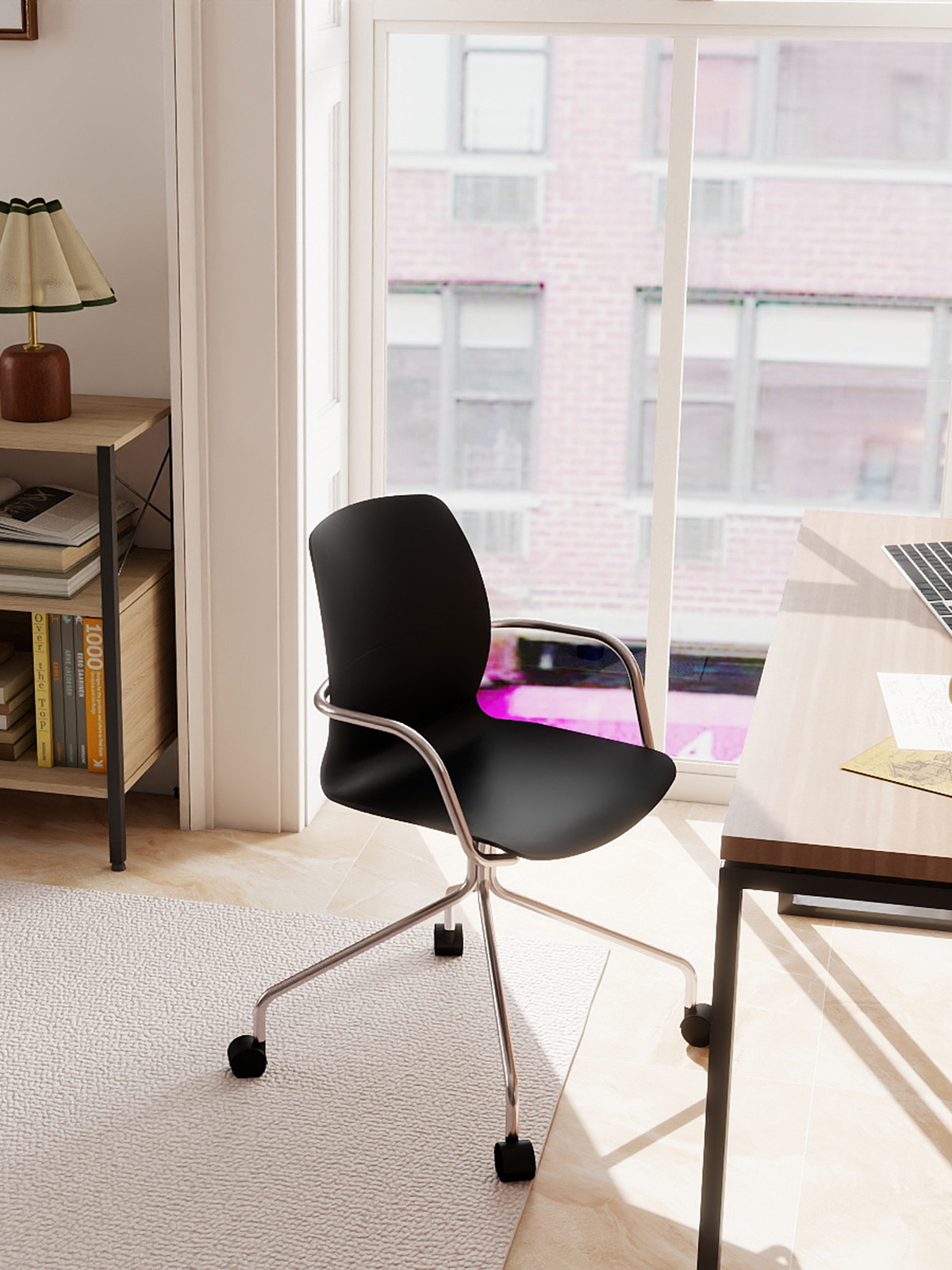 Black One-Piece Plastic Chair with Silver Metal Frame and Casters
